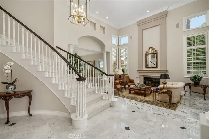 Formal living room featuring marble flooring.