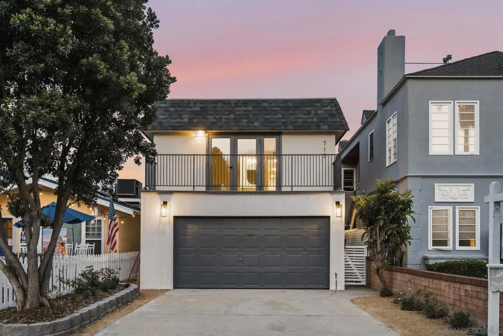Contemporary curb appeal with abundant parking.  Private side entrance.  Freshly painted exterior!