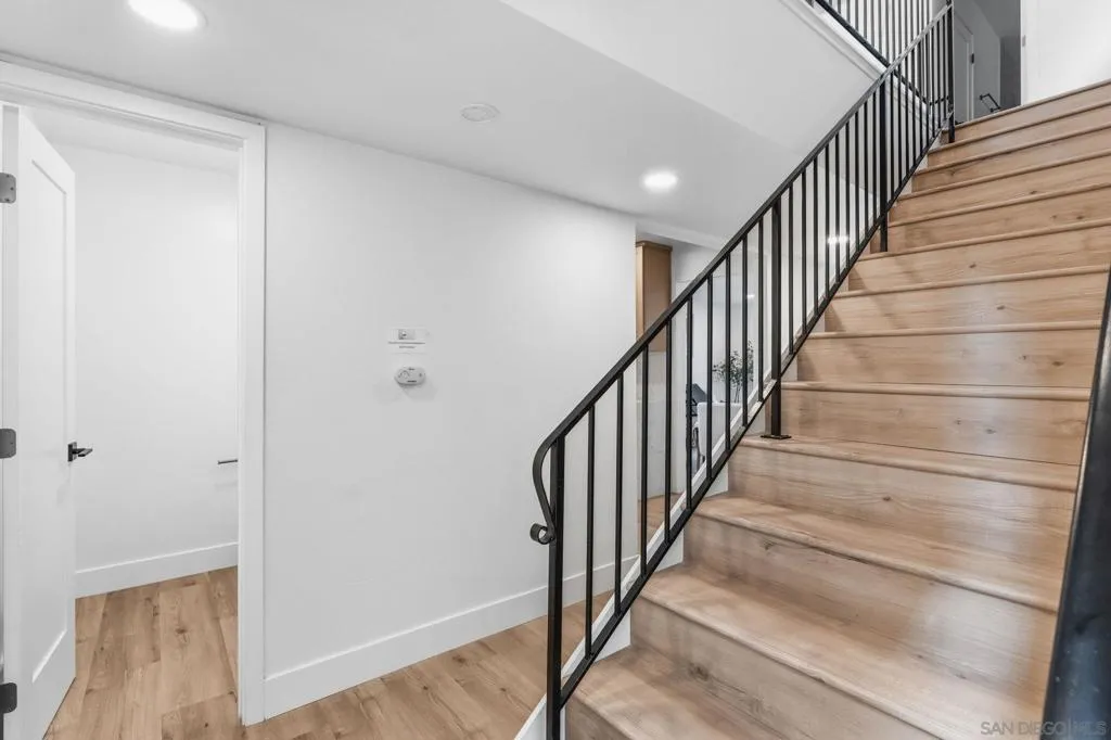 Staircase near the entry was redone with luxury vinyl plank flooring.