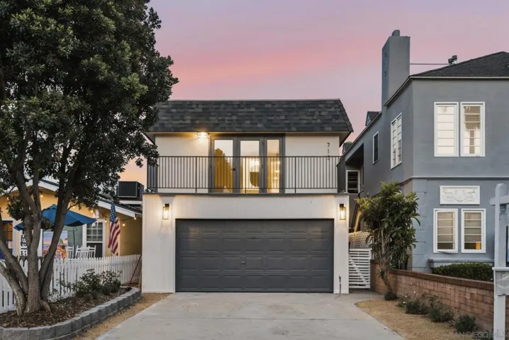 Contemporary curb appeal with abundant parking.  Private side entrance.  Freshly painted exterior!