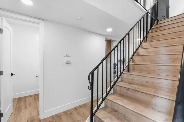 Staircase near the entry was redone with luxury vinyl plank flooring.