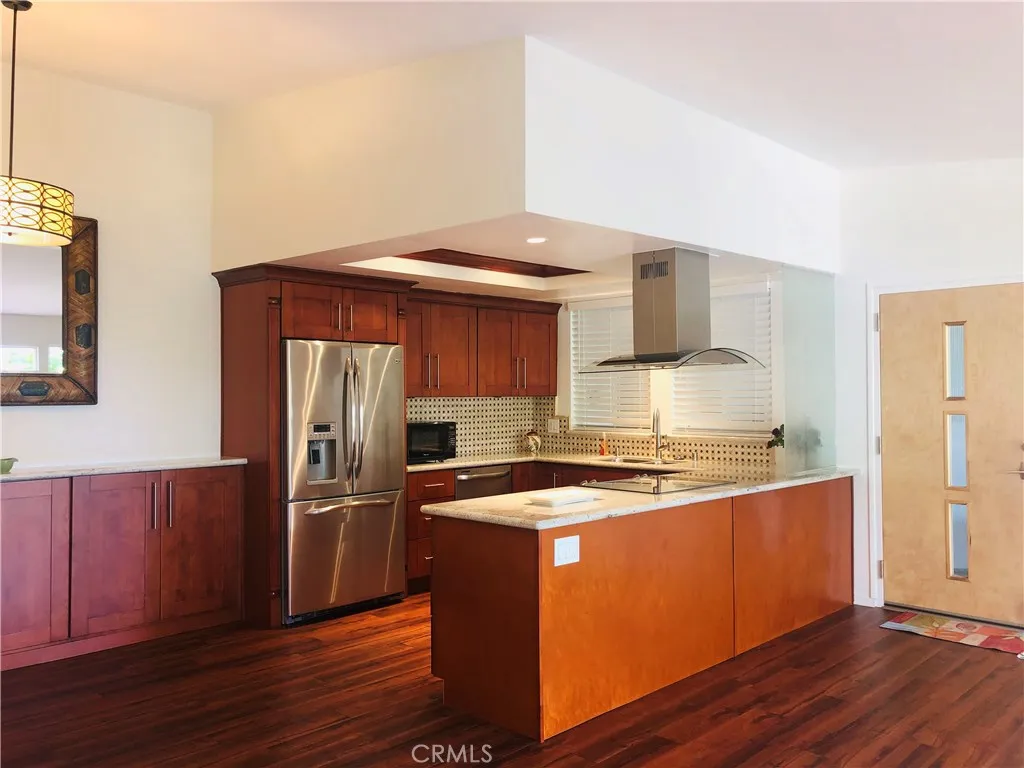 Direct access to kitchen, open concept living.