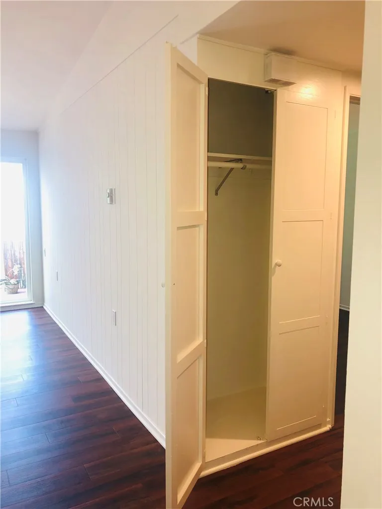 Additional hall closet with more storage.