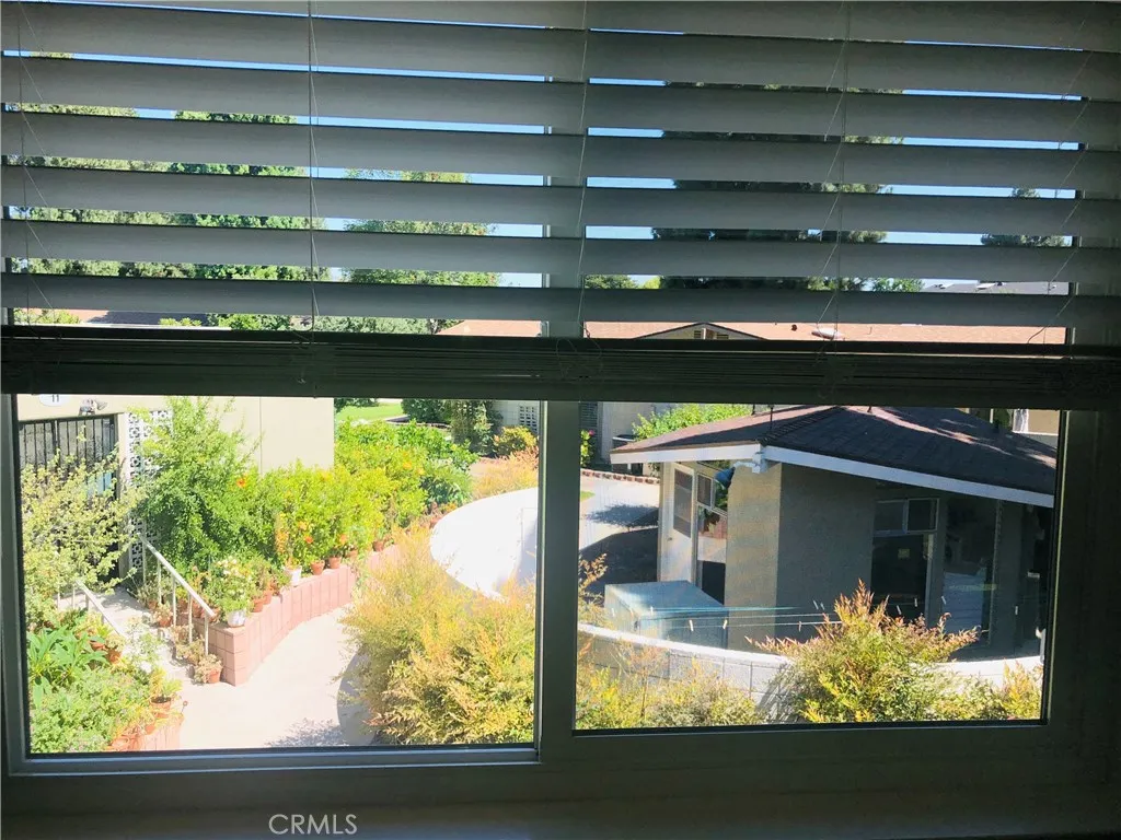 Master Bedroom window views include one of numerous Washing machine/dryer rooms for your use.