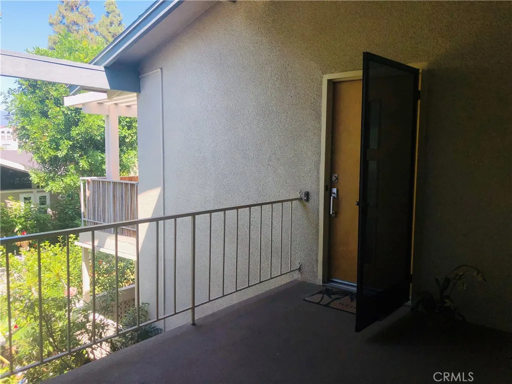 Peaceful setting includes outdoor patio, letting in an abundance of natural light