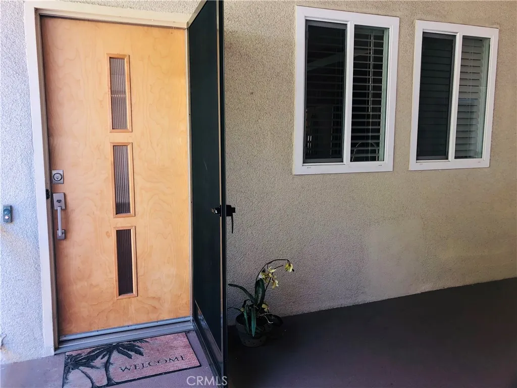 Your new Mid-Century-Modern inspired entry door (and screen door); with new dual pane energy saving windows throughout.