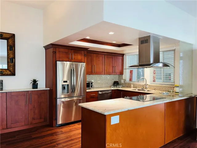 Welcome home to your remodeled kitchen with custom cabinetry, top-of-the-line stainless steel appliances, double size refrigerator/freezer and designer accents.