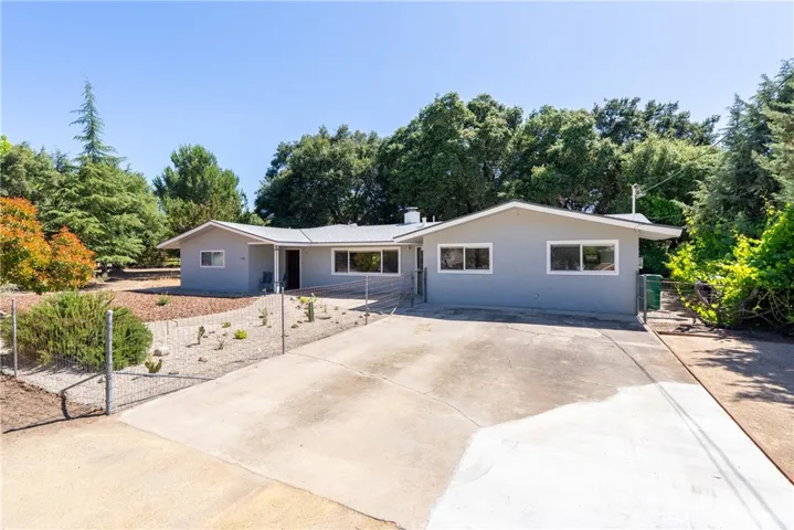 The expansive driveway easily allows you to park multiple vehicles or even a trailer or boat.