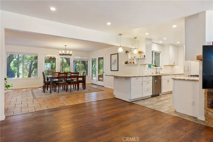 Connected to the living room is the kitchen and dining area.