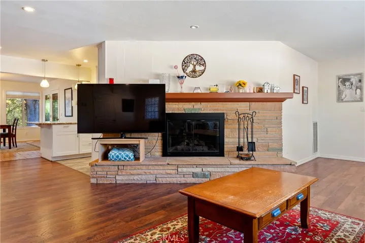 The gas fireplace with stone surround is sure to provide warmth on cool Atascadero evenings.