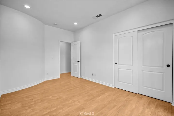One of four upstairs bedrooms