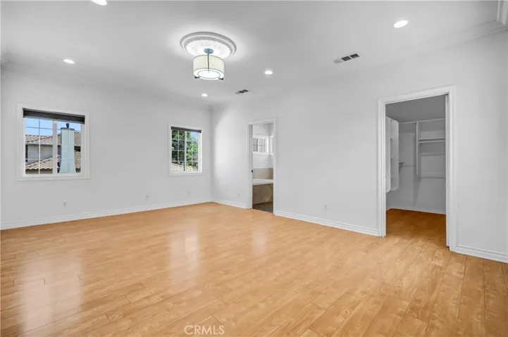 Primary bedroom upstairs with mountain views.