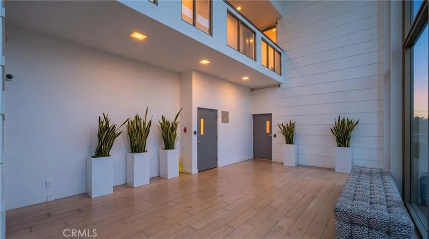 1140 E. Ocean Blvd lobby virtually enhanced sky.