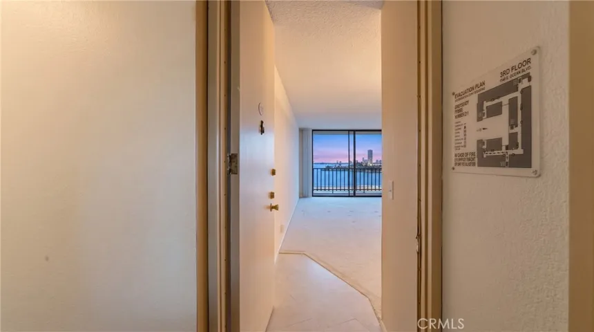 Welcome to 1140 E. Ocean Blvd #315 virtually enhanced sky.