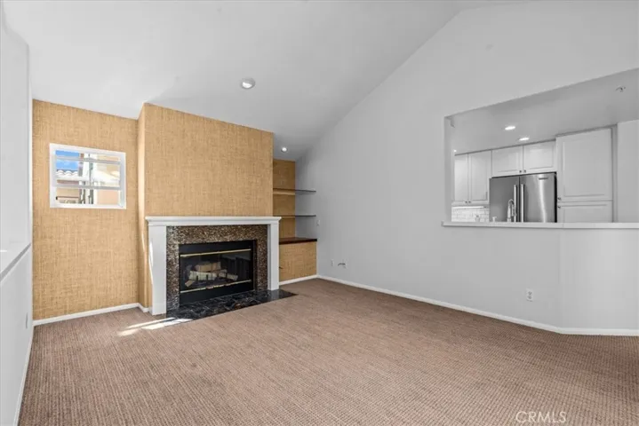 Gas burning fireplace in spacious living room
