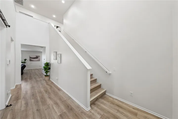Access upstairs. Left: Main floor room