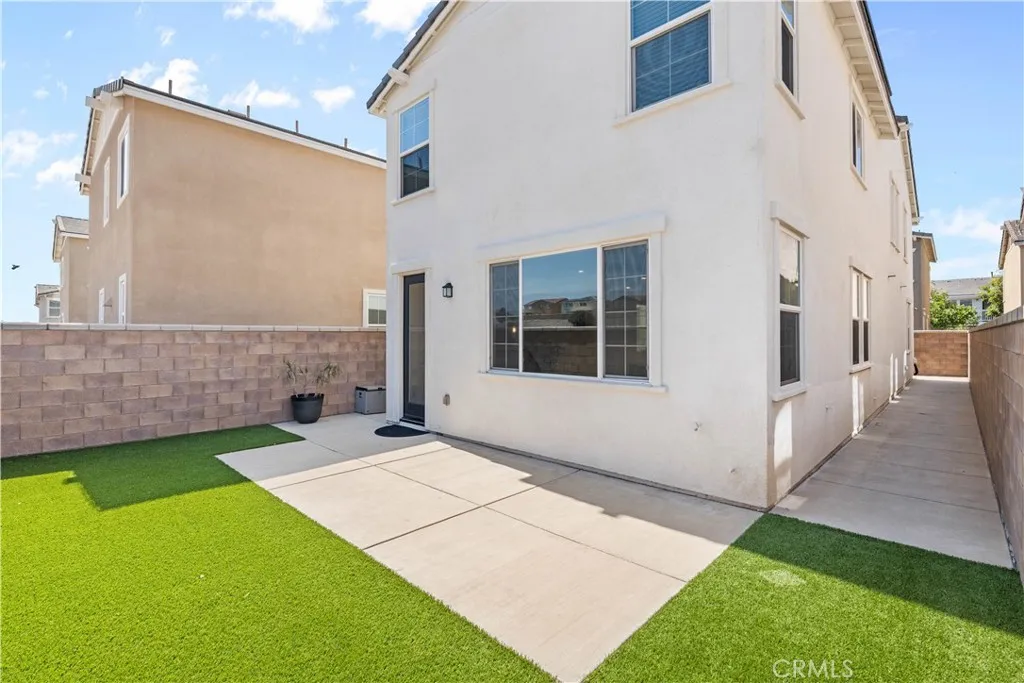 Upgraded Exterior with Turf and Large Sideyard/Dog-run