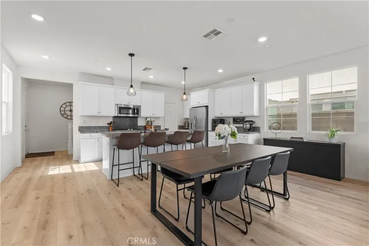 Kitchen open to dining and living area