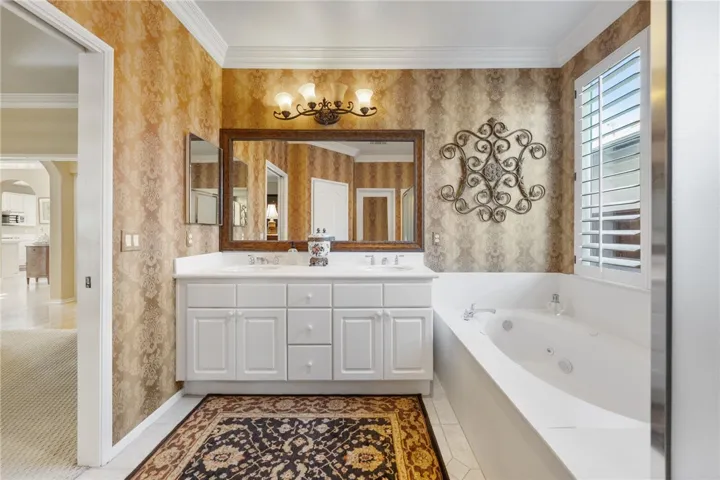Primary bath upgraded mirror and lighting