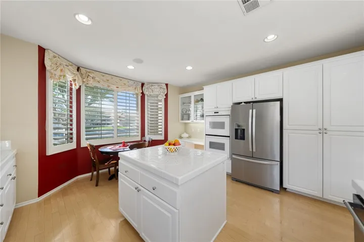 Kitchen has desk space and double ovens