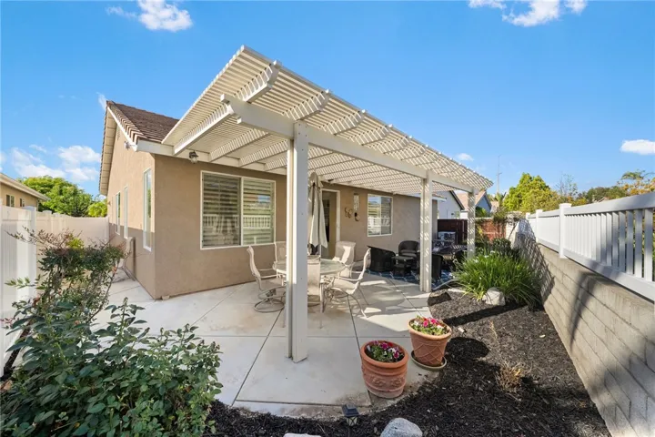 Patio showing sideyard area landscaped