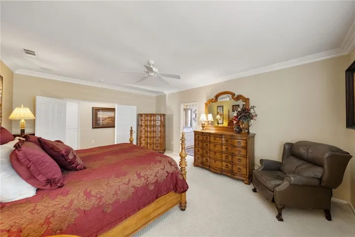 Primary bedroom with double door entry