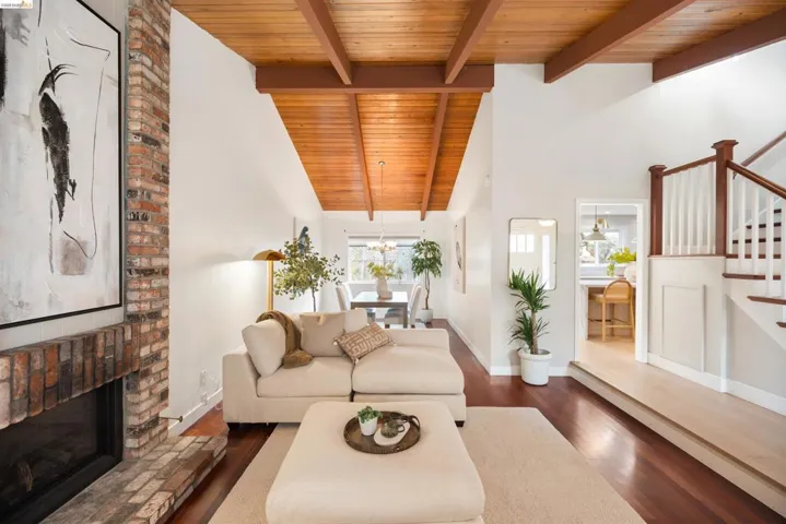 Vaulted wood plank ceiling with exposed beams