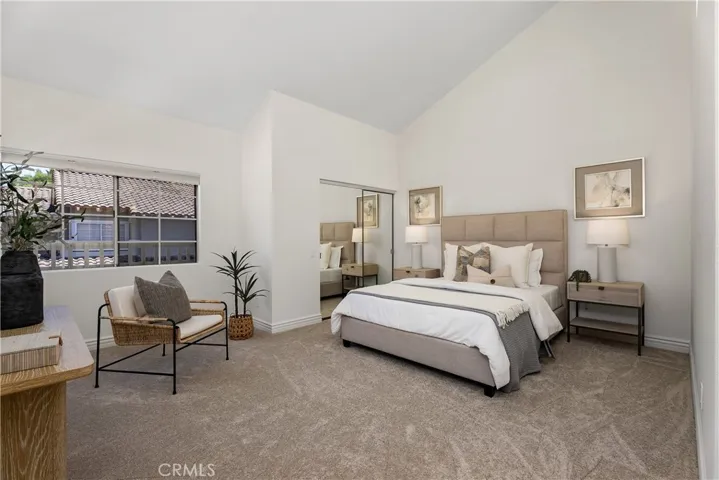 Oversized primary bedroom with walk-in closet and brand new carpet