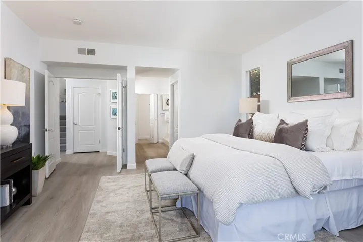 Staged photo Master bedroom down