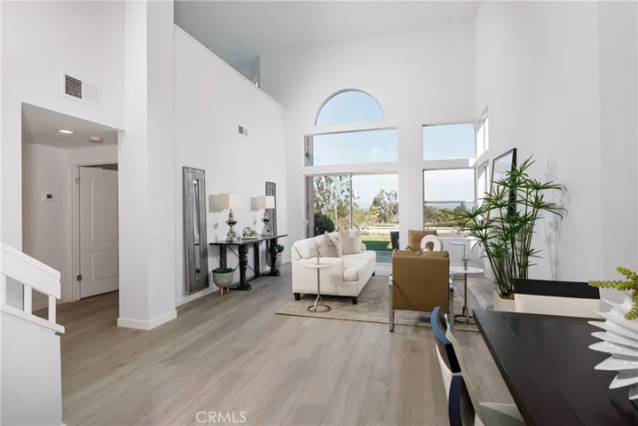Staged photo living room and dining  room
