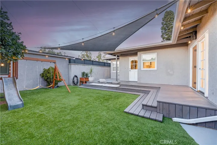 Low maintenance yard, perfect for relaxation or evening gatherings.
