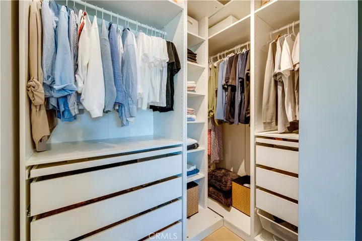 Walk-in closet of the primary suite.