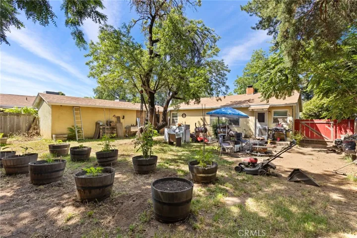 Spacious backyard featuring garage area.