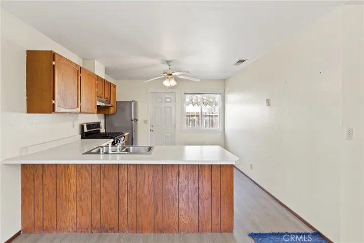 Duplex - 1700 Sherman - View of Kitchen and back door that opens up to the courtyard area.