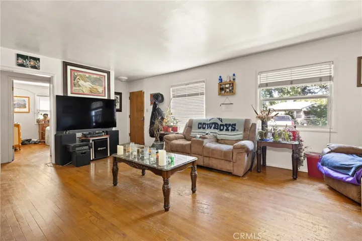 Another view of house, wood floors, dual pane windows.