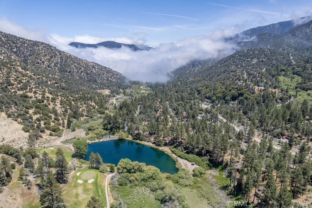 The house is just below the center of the photo. which looks east.