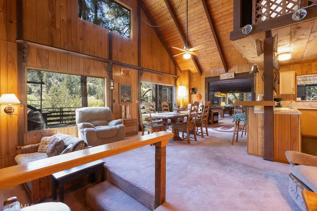 Windows and the soaring ceiling bring in views and light.