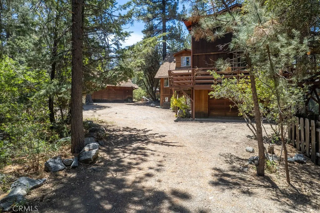 With two 2-car garages, there is plenty of room for storing vehicles and other items.
