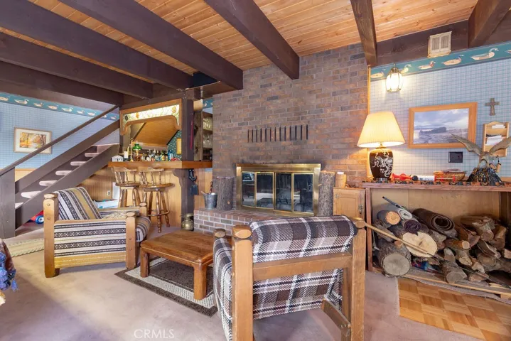 A rear staircase allows easy access to the 3 bedrooms upstairs.