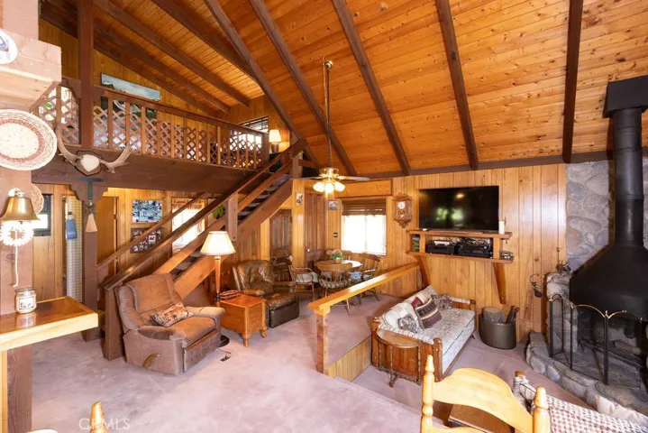 The seating area in the loft overlooks the great room.