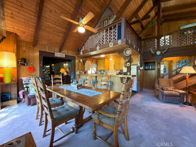 The dining area is adjacent to the kitchen.