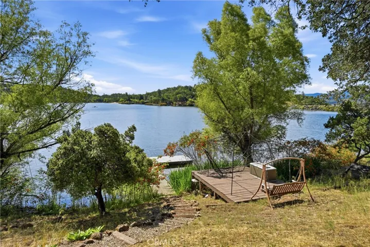 Meander down the path to private deck + dock