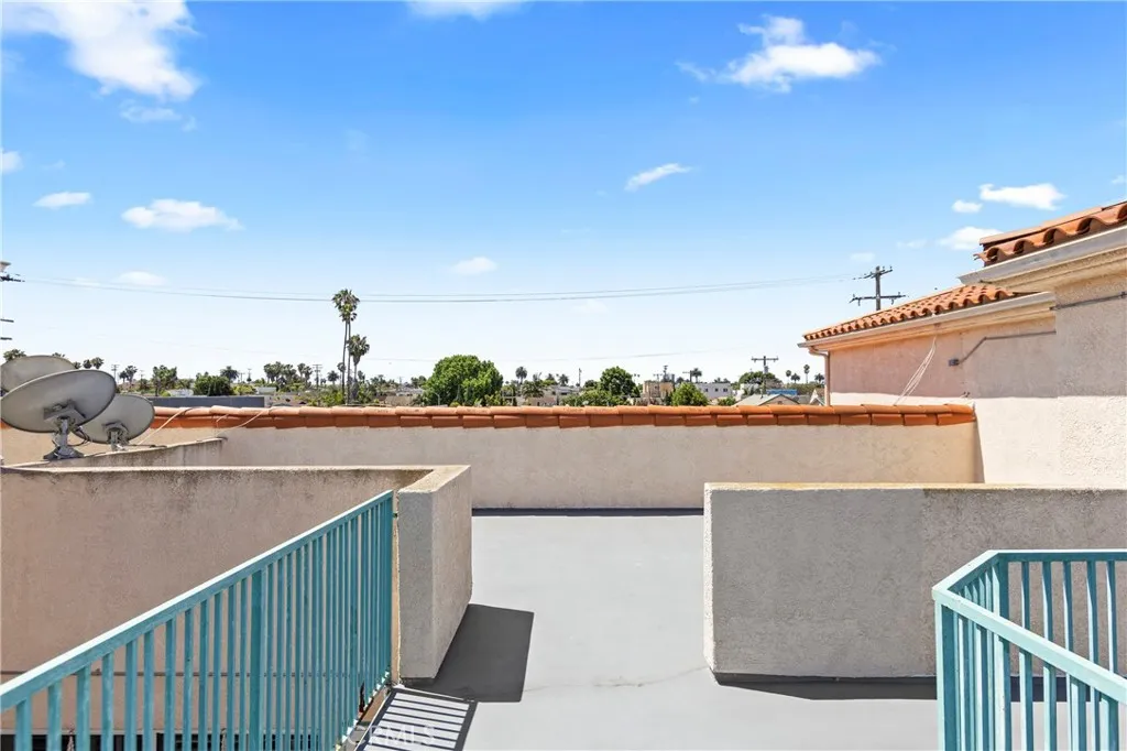 Community viewing balcony - treetop and blue sky views