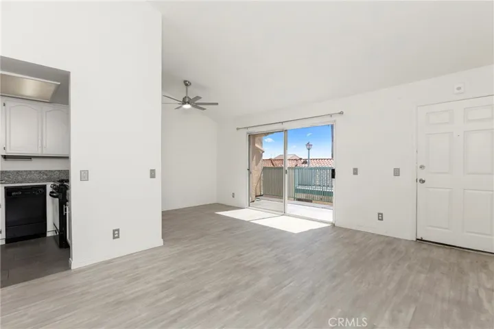 Newer laminate floors are easy maintenence, with tile in the kitchen for convenience.