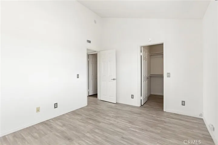 Bedroom also has large adjacent walk in closet.