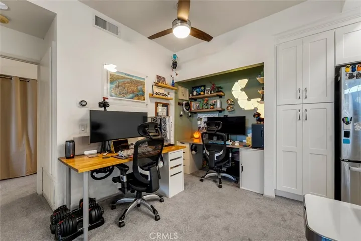 Dining room and closet space area turned into home office