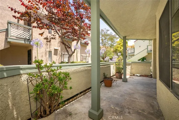 Two patios- one off living room, 1 off Primary Bedroom