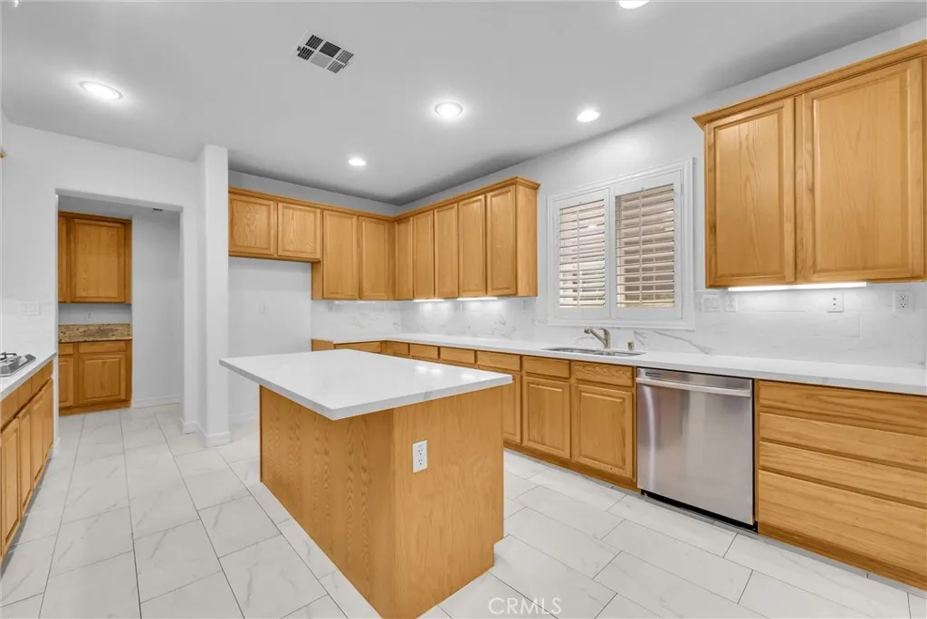 Kitchen island with breakfast bar.