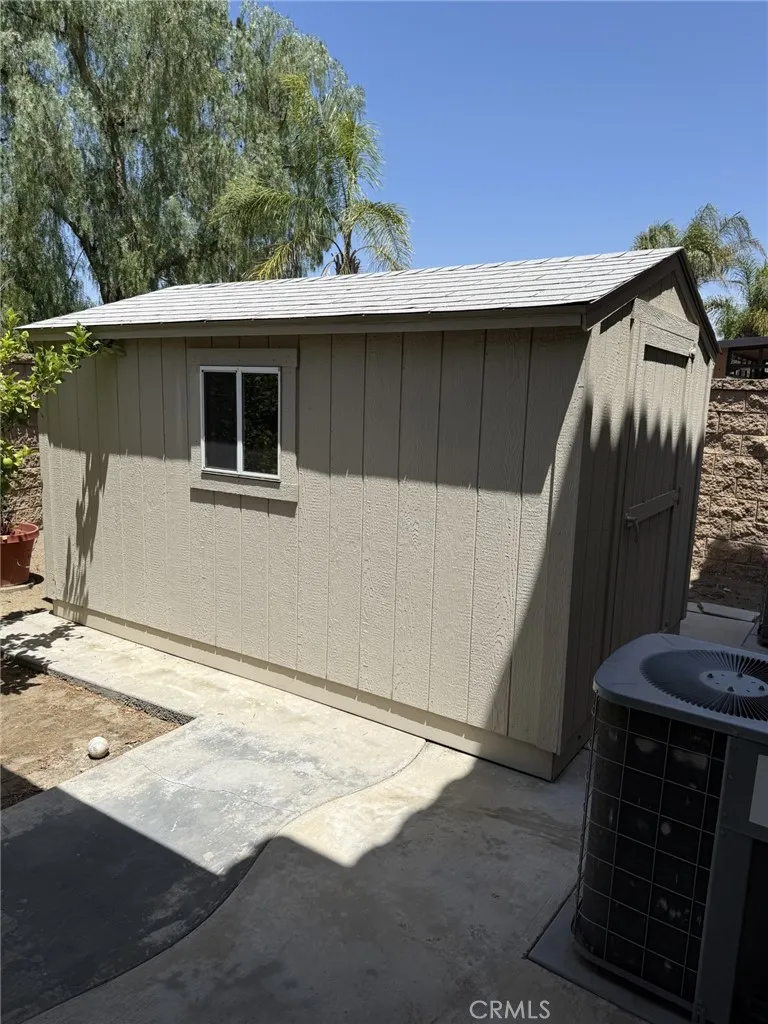 Large wood shed is included!