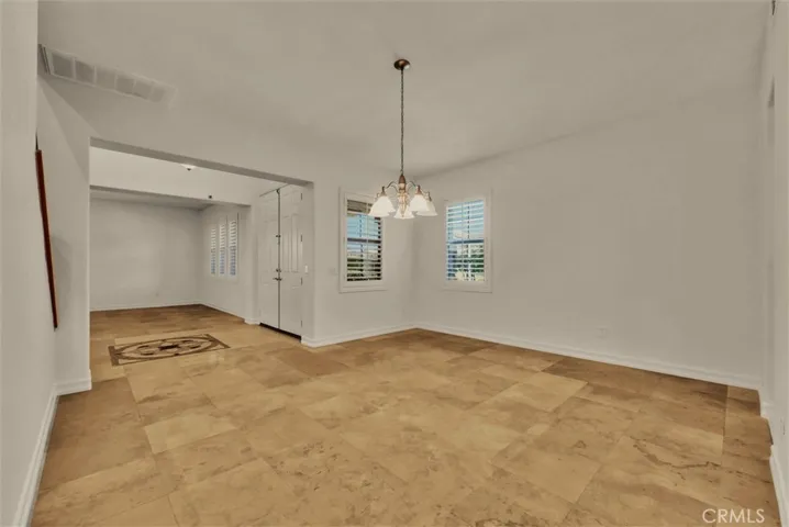 Formal dining room with travertine floor!